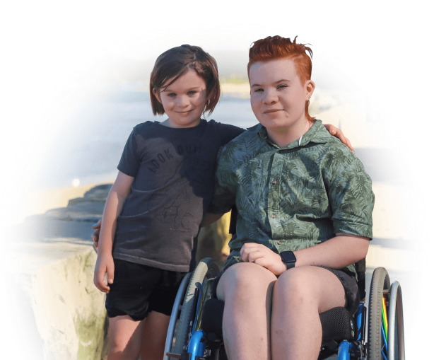 boy sitting in wheelchair